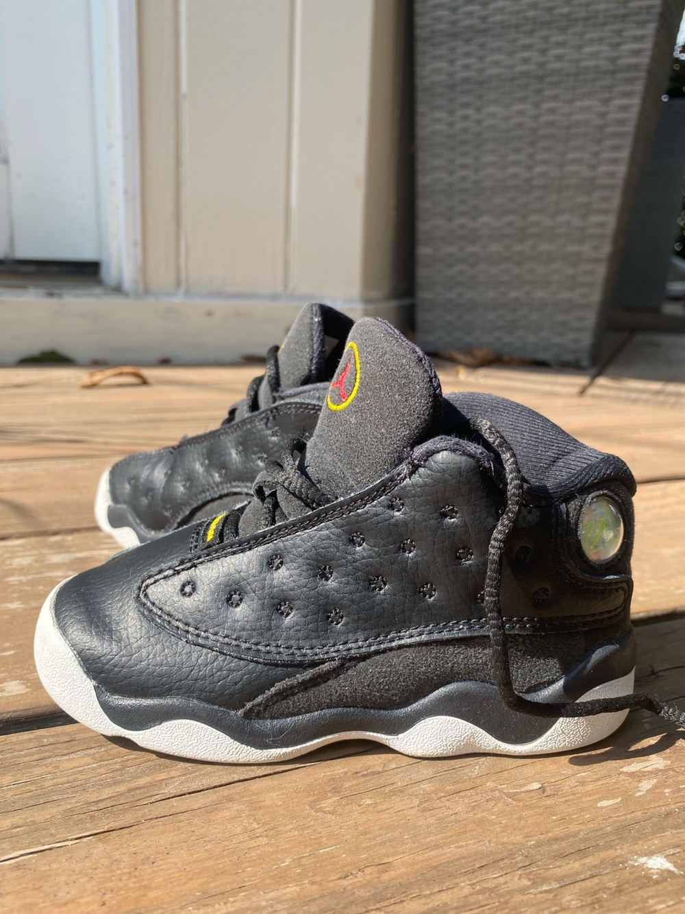 Jordan Toddler Black and White High-Top Sneakers with Yellow Accent